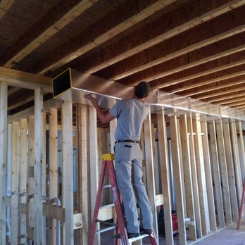 L D Mechanical Contractors - a construction worker on a ladder - Plumbing Near Me - Charleston, Illinois L D Mechanical Contractors - a construction worker on a ladder - Plumbing Near Me - Charleston, Illinois