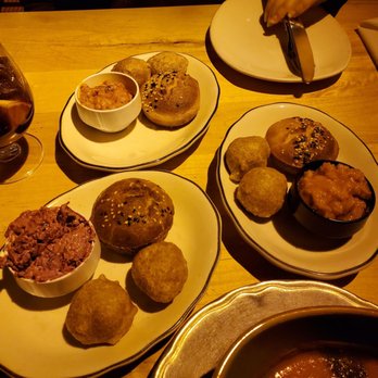 AMBAR Restaurant, Clarendon - Ajvar, Beet Tzatziki, and garlic beans spread with cornbread and sourdough buns - Modern European Near Me - Arlington, Virginia