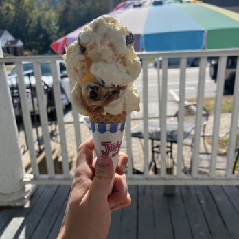 Velvet Moose Ice Cream Shoppe - a hand holding a cone of ice cream - Ice Cream & Frozen Yogurt Near Me - Warner, New Hampshire