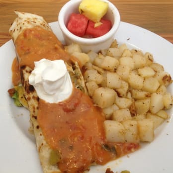 First Watch - Chickichanga, eggs, chicken, chorizo, green chilies, cheddar, Monterey jack, onions, avocado, Vera Cruz sauce, sour cream - Breakfast & Brunch Near Me - Crestview Hills, Kentucky First Watch - Chickichanga, eggs, chicken, chorizo, green chilies, cheddar, Monterey jack, onions, avocado, Vera Cruz sauce, sour cream - Breakfast & Brunch Near Me - Crestview Hills, Kentucky