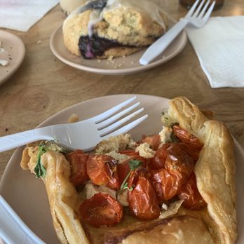 Grove Surf + Coffee - Roasted Tomato gallette with goat cheese and blueberry lavender scone - Coffee & Tea Near Me - St. Pete Beach, Florida Grove Surf + Coffee - Roasted Tomato gallette with goat cheese and blueberry lavender scone - Coffee & Tea Near Me - St. Pete Beach, Florida