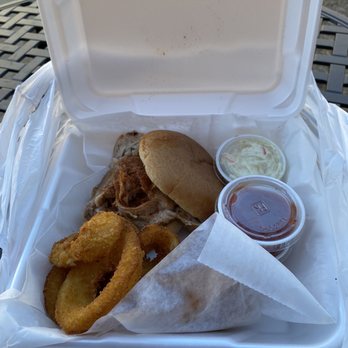 The Pig On Beale - Bbq pork sandwich with onion rings and coleslaw. - Barbeque Near Me - Memphis, Tennessee