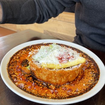 Anepalco - Red chilaquiles, chilaquiles divorciados (add cochinita pibili), coquito (best cocktail ever) and horchata cocktail. - Mexican Near Me - Orange, California