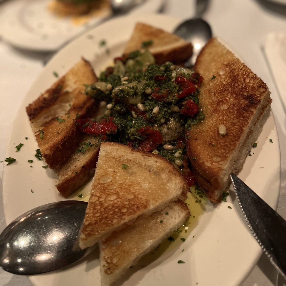 Dal Rae Restaurant - Baked Brie with Roasted Garlic - Steakhouses Near Me - Pico Rivera, California Dal Rae Restaurant - Baked Brie with Roasted Garlic - Steakhouses Near Me - Pico Rivera, California