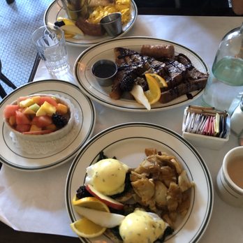 Elysian Cafe - Fruit, French toast, scrambled eggs w Fries in the back - New American Near Me - Hoboken, New Jersey