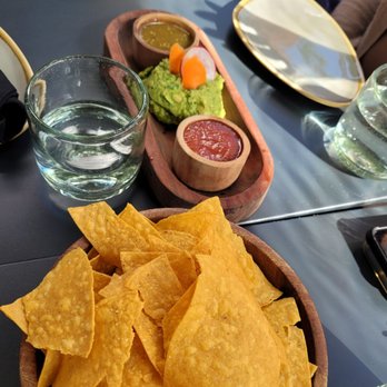 Agave Uptown - Chips & guacamole shared. Fruit infused water. Outdoor seating. - Mexican Near Me - Oakland, California