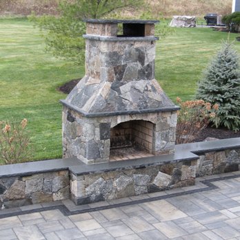 Dicicco Landscape & Irrigation - Fieldstone Fire Place w/ Blue Mist Granite Seating - Landscaping Near Me - Middleton, Massachusetts Dicicco Landscape & Irrigation - Fieldstone Fire Place w/ Blue Mist Granite Seating - Landscaping Near Me - Middleton, Massachusetts