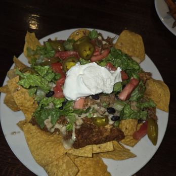 Taps Bar and Grill - Shredded chicken nachos - Sports Bars Near Me - Jacksonville, Florida Taps Bar and Grill - Shredded chicken nachos - Sports Bars Near Me - Jacksonville, Florida