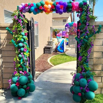 Jessica's Balloons - Encanto theme party , entrance with flowers. - Balloon Services Near Me Jessica's Balloons - Encanto theme party , entrance with flowers. - Balloon Services Near Me