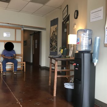 South Austin Community Acupuncture - The right view of the waiting room. The hall goes down to private rooms and the community room. The front door is behind on the right. - Acupuncture Near Me - Austin, Texas South Austin Community Acupuncture - The right view of the waiting room. The hall goes down to private rooms and the community room. The front door is behind on the right. - Acupuncture Near Me - Austin, Texas