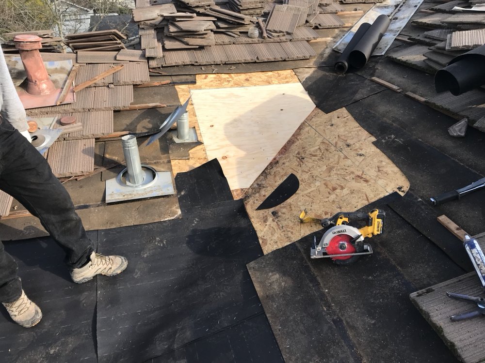 Slide of Academy Roofing