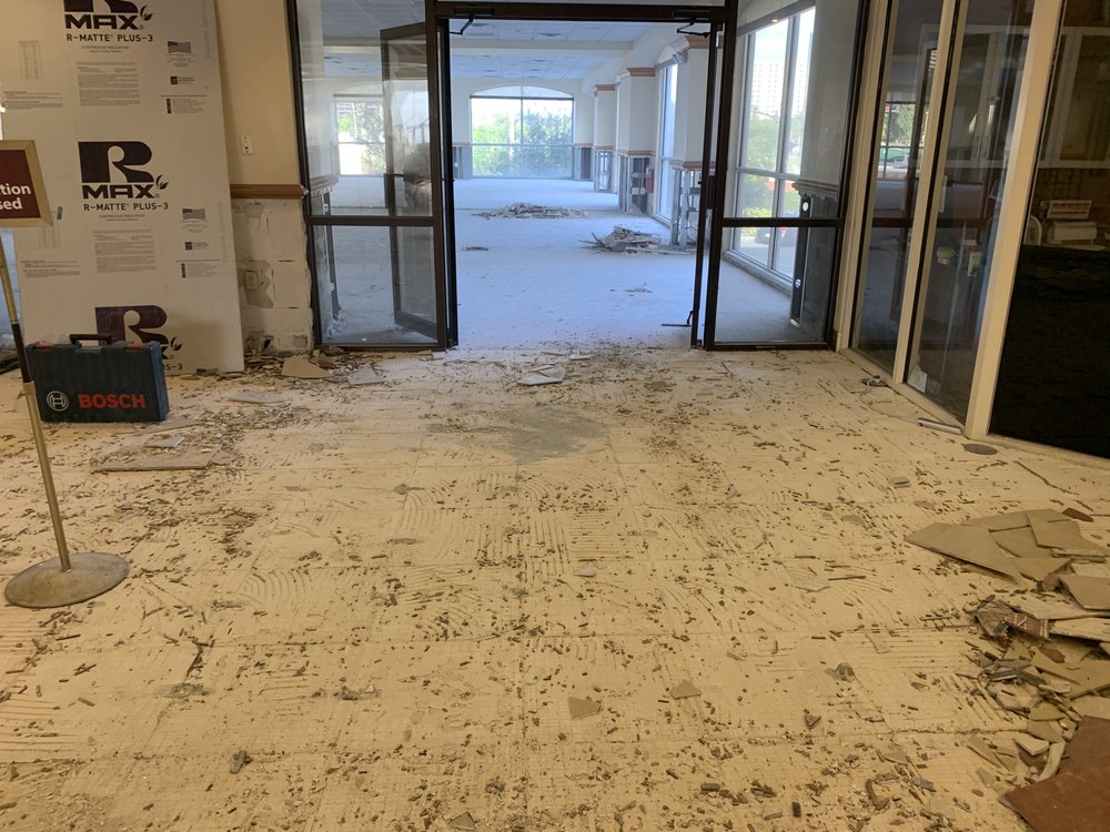 Slide of Millennia Roofing Solutions