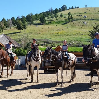 Hell's A-Roarin' Outfitters - My family, a wrangler, the horses, and a couple of the ranch buildings. - Horseback Riding Near Me - Gardiner, Montana