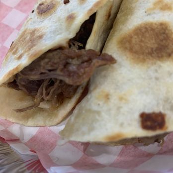 TacoMania - Close up of the braised brisket - Mexican Near Me - Riverton, Utah TacoMania - Close up of the braised brisket - Mexican Near Me - Riverton, Utah