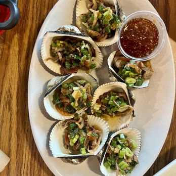 Juicy Claws Restaurant - Grilled clams - Seafood Near Me - Austin, Texas Juicy Claws Restaurant - Grilled clams - Seafood Near Me - Austin, Texas