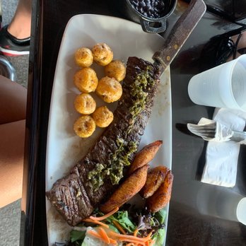 Sofrito Latin Cafe - Churrasco with black beans, sweet plantains, and Papa Criolla - Latin American Near Me - Orlando, Florida Sofrito Latin Cafe - Churrasco with black beans, sweet plantains, and Papa Criolla - Latin American Near Me - Orlando, Florida