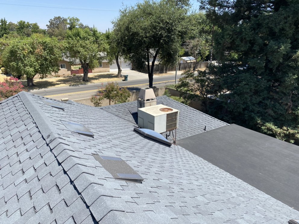 Slide of Modern Roofers and Restoration