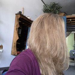 I straightened my curly hair to see the cut lines. It's a bob/mullet cut