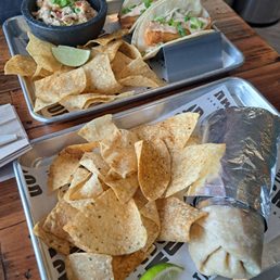 Street corn salad, Baja fish tacos, and avocado shrimp burrito