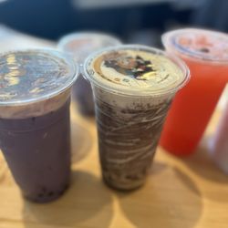 Share A Tea - A bubble tea party! Cookies n cream in front. Right strawberry yokult. Left Uve