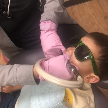 Say Ahhh! Pediatric Dentistry - Cleaning my sons teeth. - Pediatric Dentists Near Me - Houston, Texas