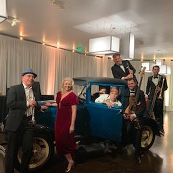 Big Lucky - Here's the band posing with a Model T at my event. - Musicians Near Me Big Lucky - Here's the band posing with a Model T at my event. - Musicians Near Me