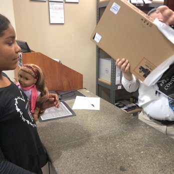 Micro Center - Paying for wrapping up her laptop - Electronics Near Me - Houston, Texas Micro Center - Paying for wrapping up her laptop - Electronics Near Me - Houston, Texas