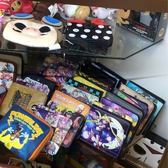 Optimus Toys - if you look in the case, be prepared to be glared at. I was simply trying to see past the disorganization - Toy Stores Near Me - Mission Viejo, California