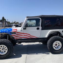 Jeep wrapped in American flag Jeep wrapped in American flag