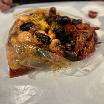 Star Crab - Side view: black mussels, crawfish and shrimp Potatoes, corn and sausage - Cajun/Creole Near Me - Upland, California Star Crab - Side view: black mussels, crawfish and shrimp Potatoes, corn and sausage - Cajun/Creole Near Me - Upland, California