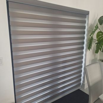 West Coast Blinds - Backdoor zebra remote blinds. Beautiful gray color. Beautifully installed. - Windows Installation Near Me