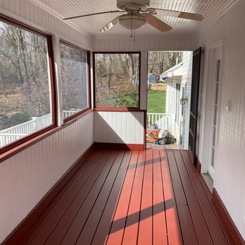 JAL Construction - a porch with a ceiling fan - General Contractors Near Me - Lacomb, Louisiana