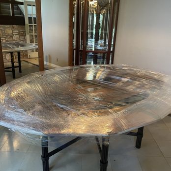 The Moving Kings - Glass table protected with card board and shrink wrap - Movers Near Me - Round Rock, Texas The Moving Kings - Glass table protected with card board and shrink wrap - Movers Near Me - Round Rock, Texas