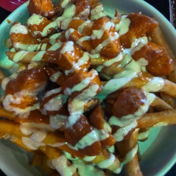 Perikitos Cantina Botanera - Buffalo Fries good not spicy $11,  Tostada Oriental was more spicy but I liked it best - not bad for $2.75, Street Tacos was $7 and good - Tapas Bars Near Me - Eagle Pass, Texas