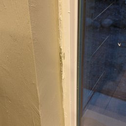 This is what Royalty Renovations considered a "finished" job. Paint and spackling on window frame. This is what Royalty Renovations considered a "finished" job. Paint and spackling on window frame.