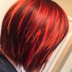 Petra's Salon and Boutique - Funky and fun orange/red tones and cut by Kat