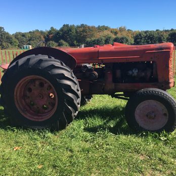 Doe Orchards - Old tractors for kids to play on or for photo ops - Pick Your Own Farms Near Me - Harvard, Massachusetts