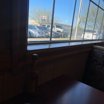Ramblin Roads Restaurant - a view of a parking lot through a window - American Near Me - Ogden, Utah Ramblin Roads Restaurant - a view of a parking lot through a window - American Near Me - Ogden, Utah