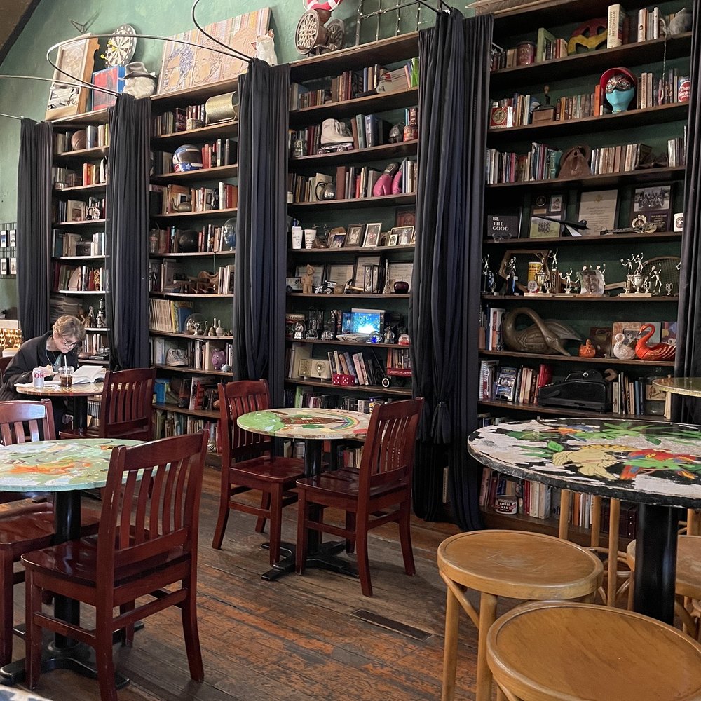 Back to the Grind - Library of books inside Back to the Grind - Coffee & Tea Near Me - Riverside, California