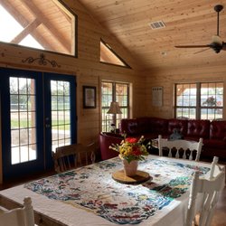 Freedom Lives Ranch RV Resort - Clubhouse with full kitchen, laundry, showers, TV and a hot tub and grill on the patio
