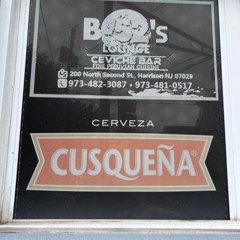 B-52 Lounge and Restaurant - sign in window - Peruvian Near Me - Harrison, New Jersey B-52 Lounge and Restaurant - sign in window - Peruvian Near Me - Harrison, New Jersey