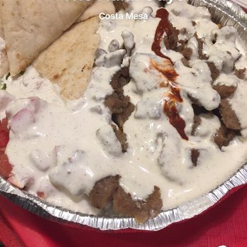 The Halal Guys - Regular beef gyro tonight. Late night dinner. I know you can't see it, but under the white sauce is a bed of rice, lettuce and tomato. - Halal Near Me - Costa Mesa, California
