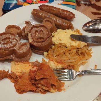 Storytellers Cafe - Brunch spread: Mickey waffles, hash browns, chilaquiles, eggs, sausage - Breakfast & Brunch Near Me - Anaheim, California Storytellers Cafe - Brunch spread: Mickey waffles, hash browns, chilaquiles, eggs, sausage - Breakfast & Brunch Near Me - Anaheim, California