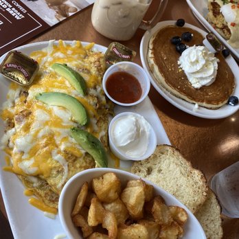 Another Broken Egg Cafe - The Lucy Omelette plus goat chess with lemon pancake!!  Eggs Benedict with Salmon!  Cold Brew Hazelnut with Strawberry Mamosa! - Breakfast & Brunch Near Me - Houston, Texas