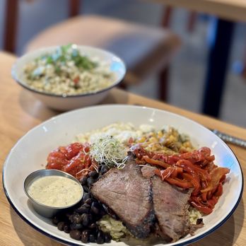 Salted Melon - Street Car Bowl (Grass-fed steak, cilantro rice, black beans, roasted tomatoes, red bell peppers, sweet corn, avocado poblano dressing) - Cocktail Bars Near Me - Charlotte, North Carolina Salted Melon - Street Car Bowl (Grass-fed steak, cilantro rice, black beans, roasted tomatoes, red bell peppers, sweet corn, avocado poblano dressing) - Cocktail Bars Near Me - Charlotte, North Carolina