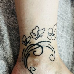 The Garrison Tattoo - Rollen did a great job on our mother daughter tattoos. Gentle and thorough, as he had to redesign it to fit our desired placement. Love!