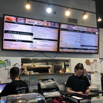 Mama's Pizza - two people at the counter - Pizza Near Me - Alpharetta, Georgia Mama's Pizza - two people at the counter - Pizza Near Me - Alpharetta, Georgia