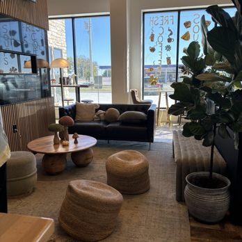 Cooper's Coffee + Eatery - Sitting area next to electric fireplace - Cafes Near Me - Nelson, Missouri