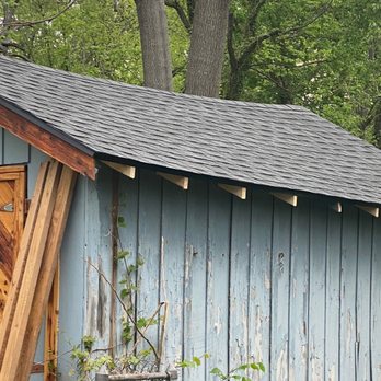 Alvarez Flooring - Repaired roof of a shed - Flooring Near Me - Lexington, Kentucky