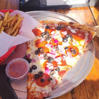 Shane's Pizza On 87 - One large slice of pizza fries and a cold beer. - Salad Near Me - Chandler, Arizona Shane's Pizza On 87 - One large slice of pizza fries and a cold beer. - Salad Near Me - Chandler, Arizona